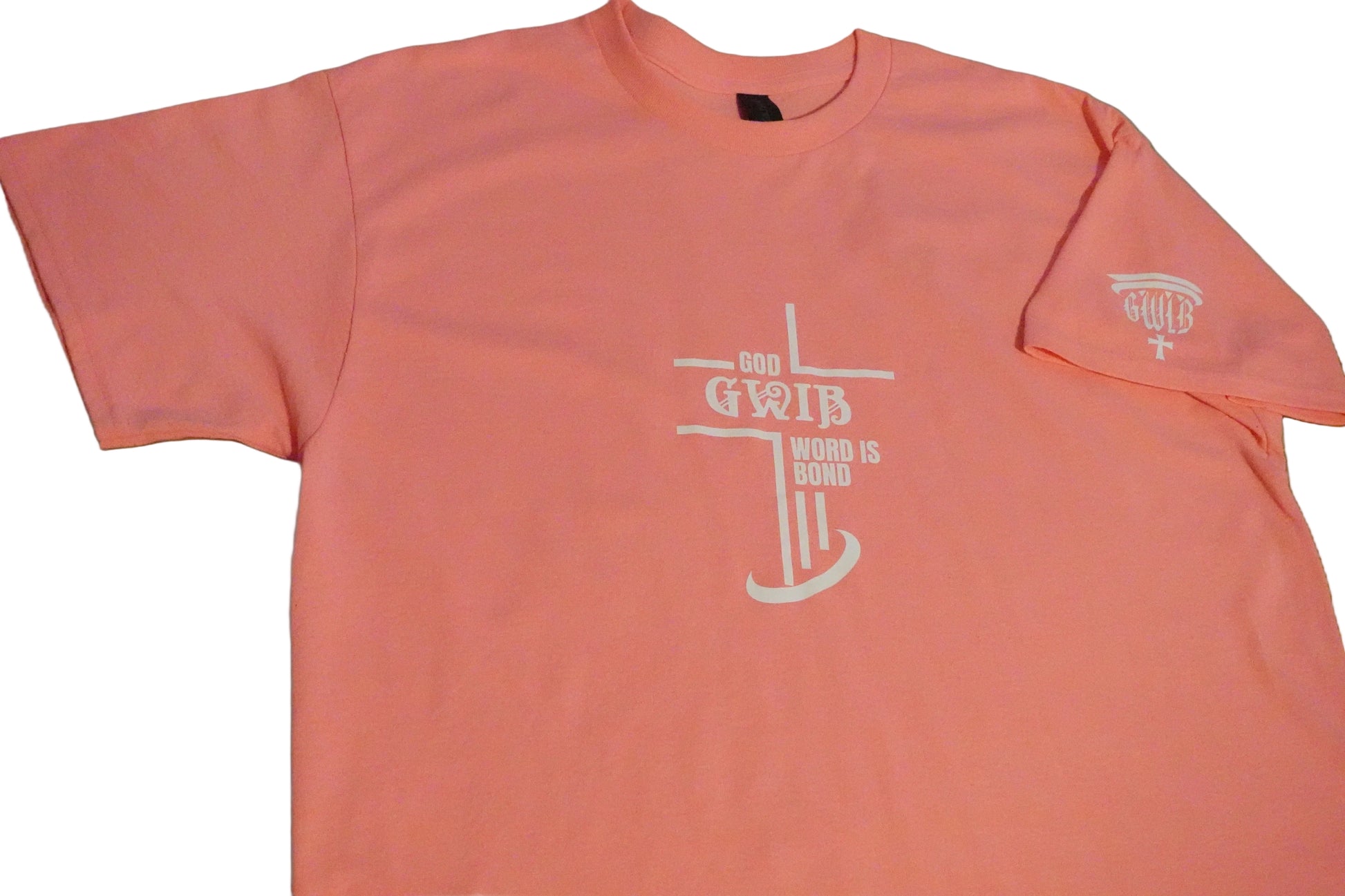 Pink t-shirt with white letters and a cross design on a white background. GWIB-God Word Is Bond