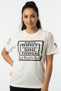 White T shirt with black lettering Built God Tough with rhinestones.