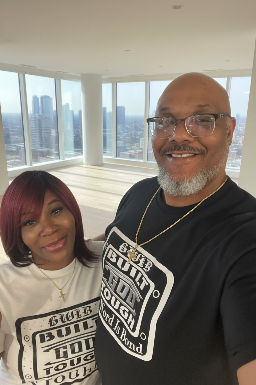 Black T-Shirt with motivational white and silver Built God Tough design on the front and the word Blessed with a cross on the back