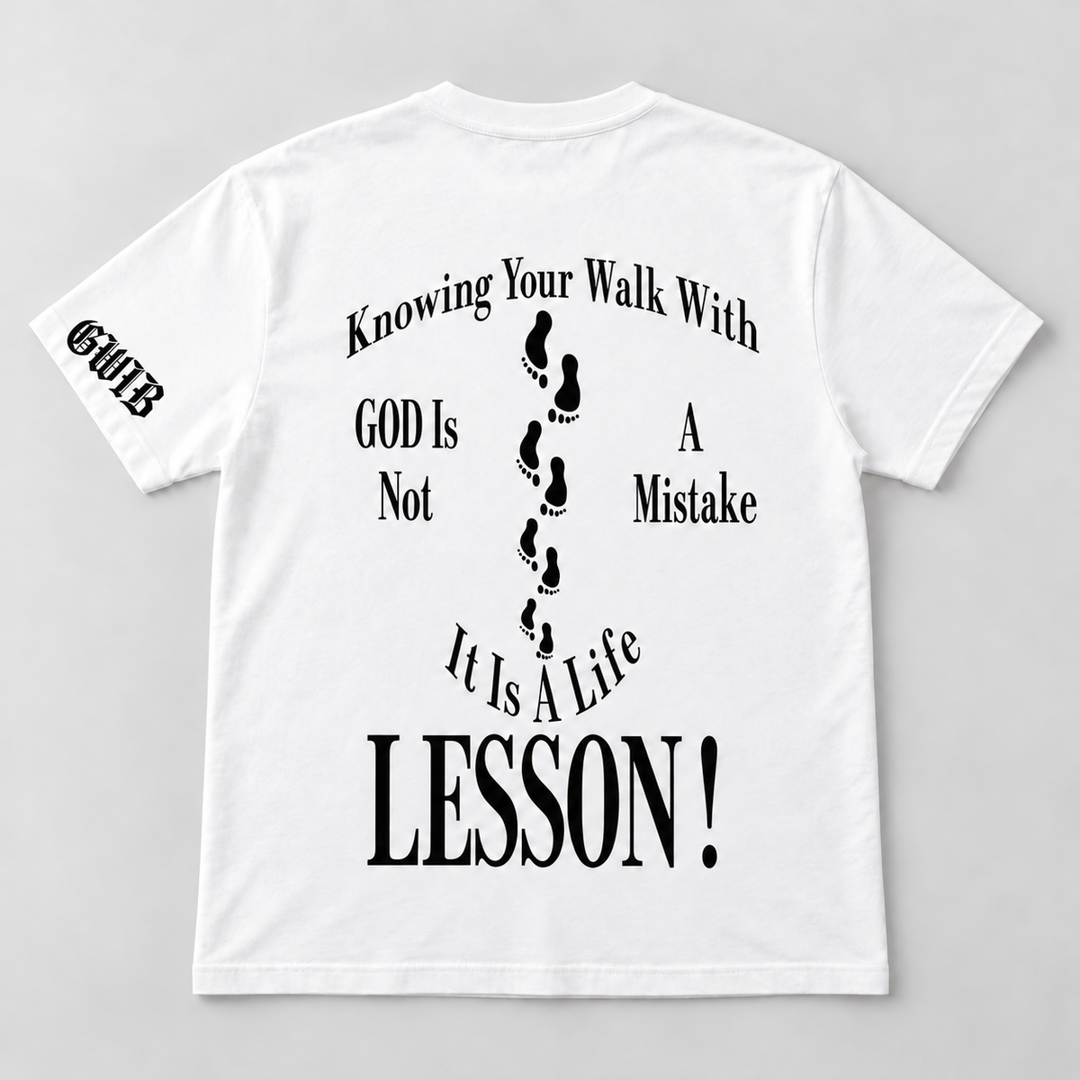 Back of white Walk with God Christian T-shirt with black footprints and GWIB sleeve logo