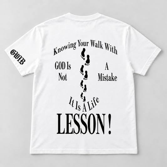 Back of white Walk with God Christian T-shirt with black footprints and GWIB sleeve logo